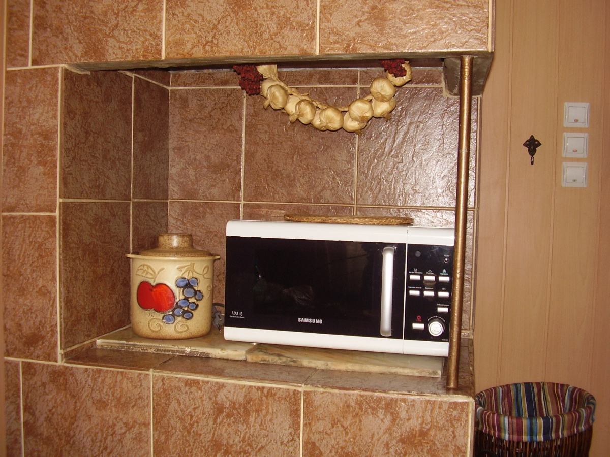 Облицовка печи керамической плиткой своими руками: видео и фото инструкция